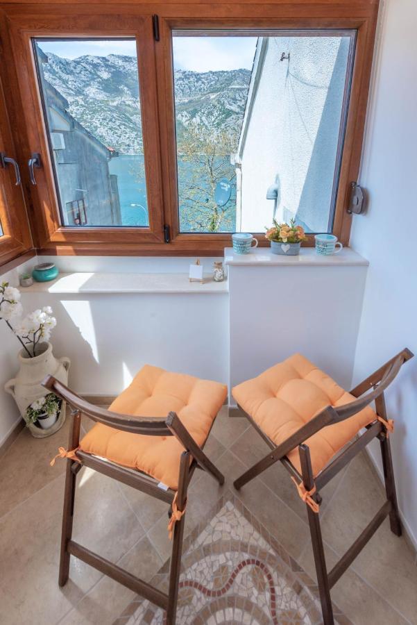 Rhizon Apartment Risan Bagian luar foto