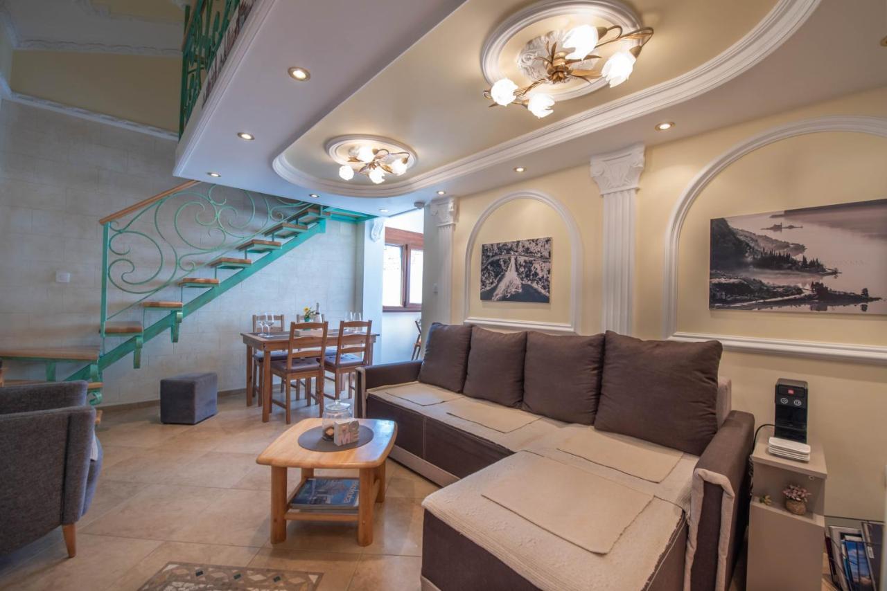 Rhizon Apartment Risan Bagian luar foto